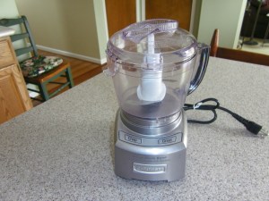A food processor.  Mine is just 4-cups, which works most of the time.  If you want something larger, Cuisinart has a great 11 -cup model that I would also like to have.